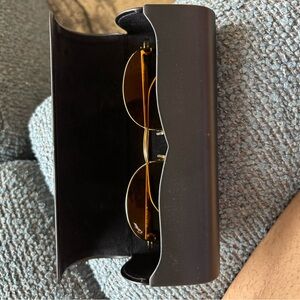 Cartier Gold Rim Oval Sunglasses with Amber Lenses